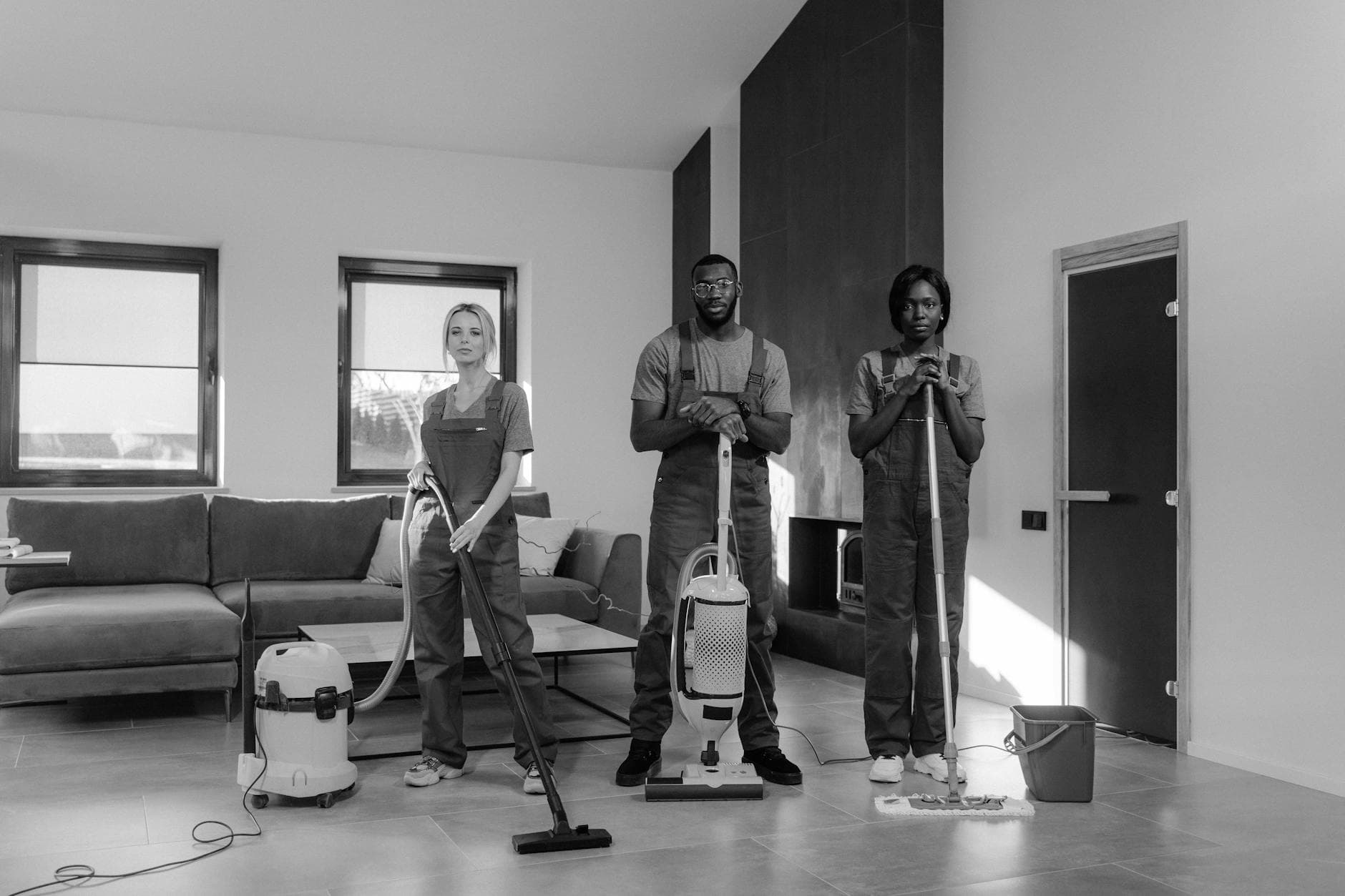 Three professional Your Business cleaners in uniform with equipment, ready for a job — Office Cleaning in Valhalla, Westchester