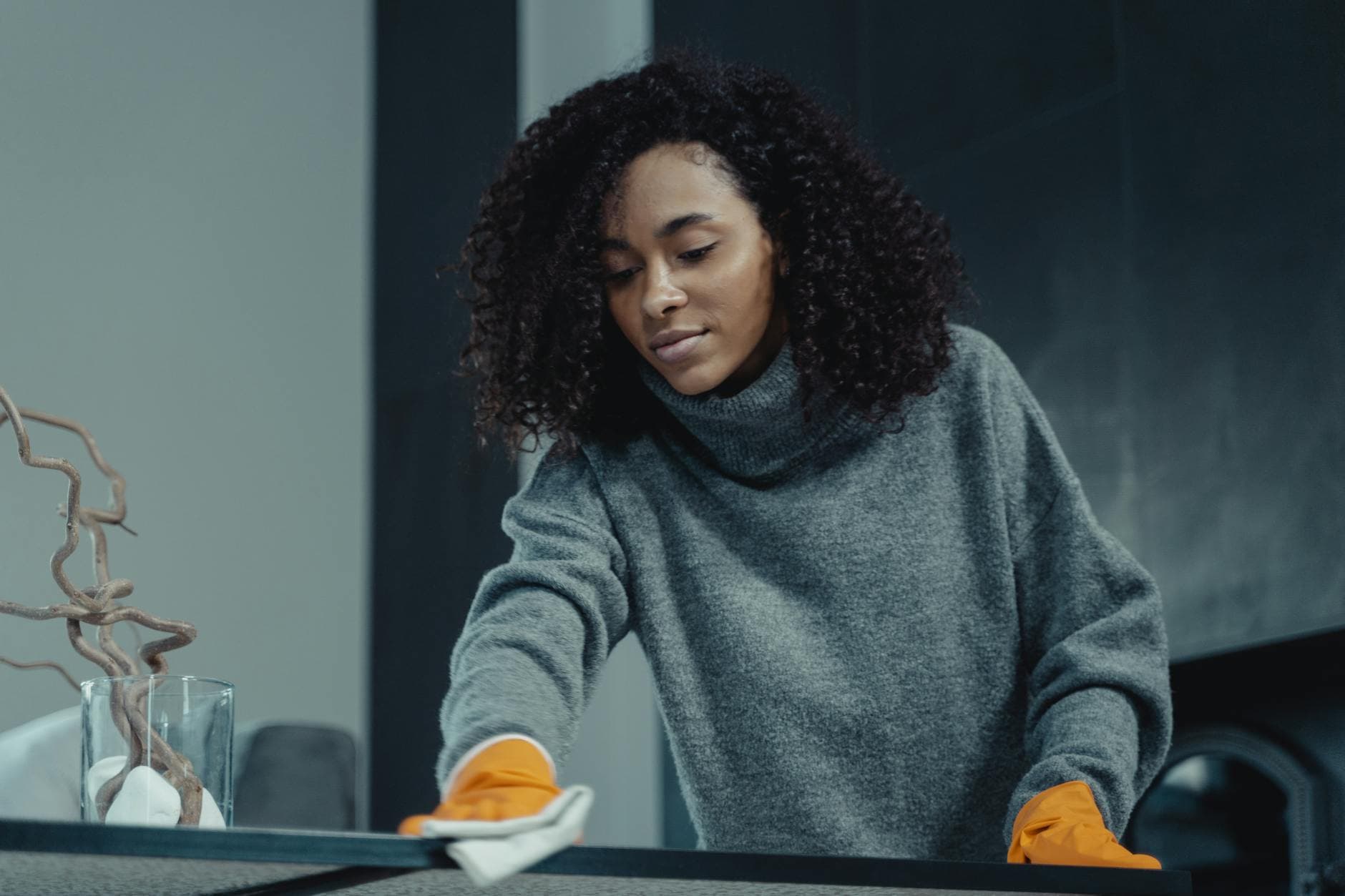 Your Business cleaner wiping a table in a New York City apartment — cleaning services in Bay Ridge South, Brooklyn